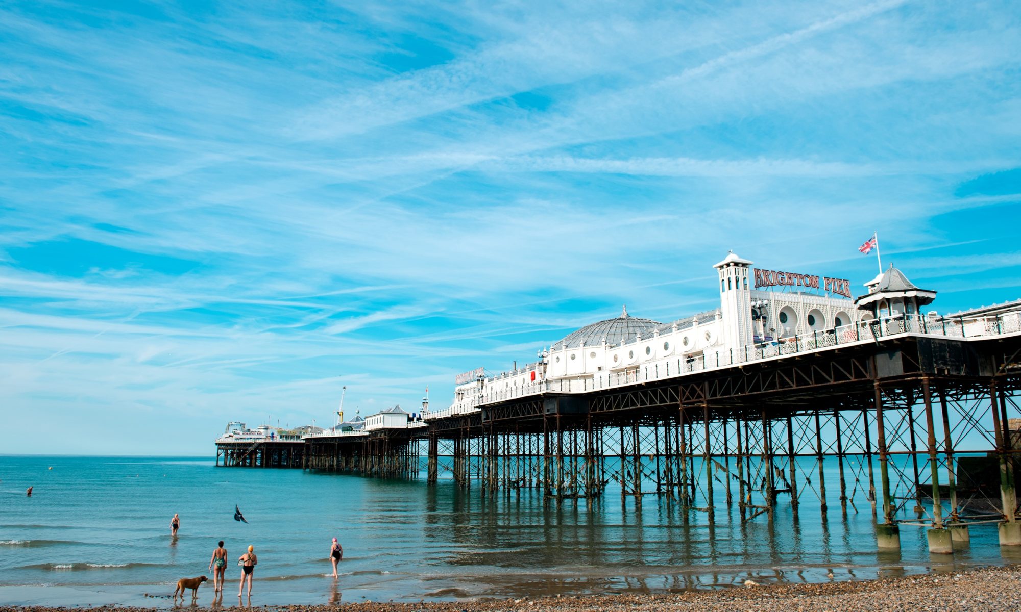 BRIGHTON, UK - JUNE 16, 2015: Brighton Marine Palace and Pier is popular tourist attraction, which opened in 1899.